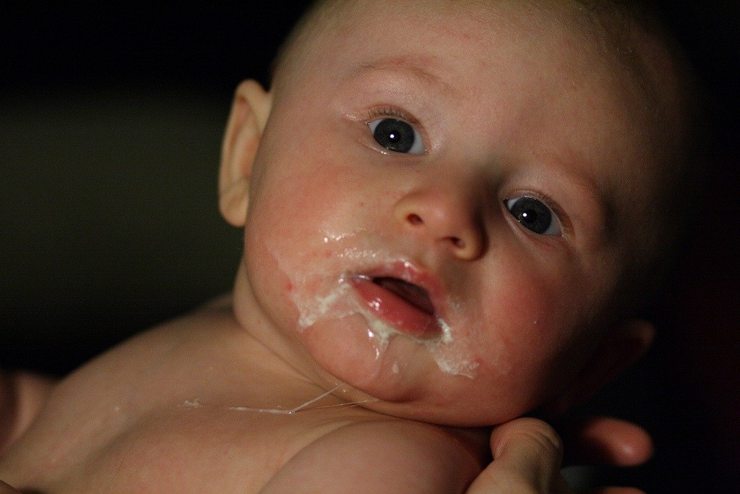baby vomiting after feeding through nose